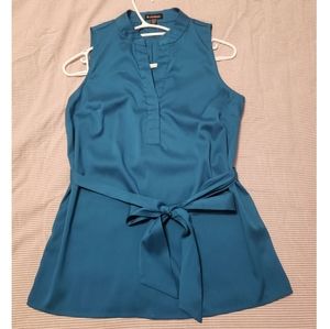 Le château blue sleeveless blouse with tie